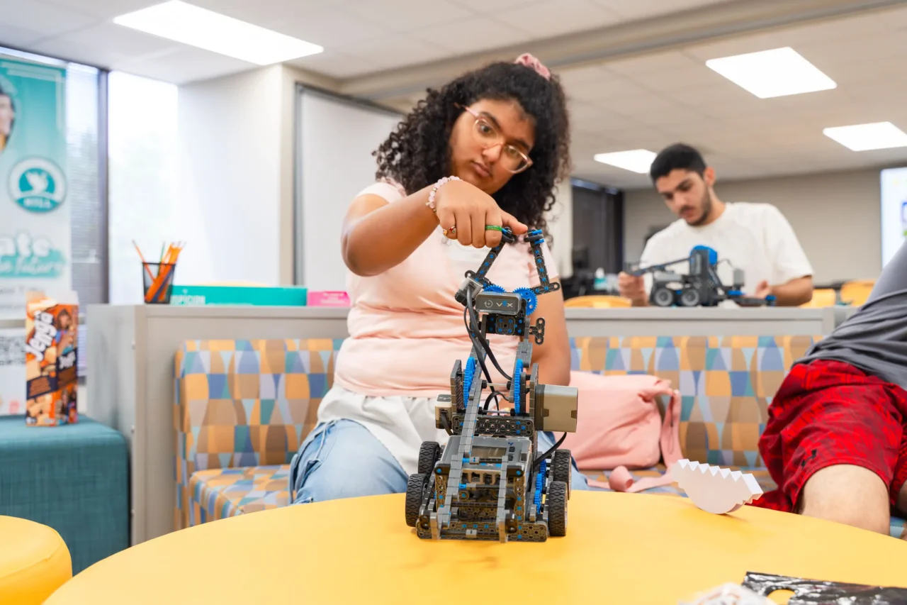 Student at Heron Virtual Academy builds a robot, illustrating hands-on support and connection for every student.