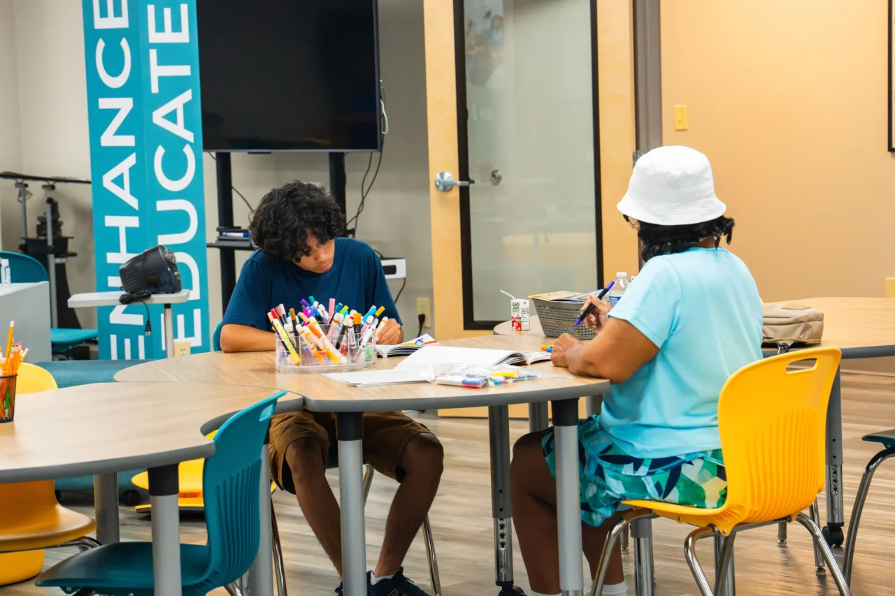 Students engaging in activities at a learning lab; a shared community soon opening across South Carolina.